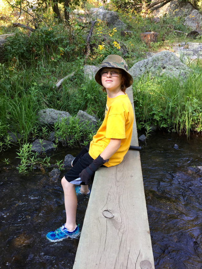 Nick cooling his feet in the creek.